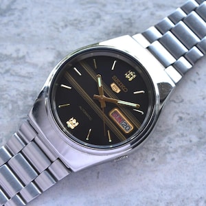 SEIKO クォーツ 時計 1986年製 ゴールド/ブラック SEIKO クォーツ 時計 1986年製 ゴールド/ブラック
