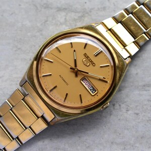 SEIKO クォーツ 時計 1986年製 ゴールド/ブラック Yahoo!オークション -「1986」(さ行) (ブランド腕時計)の落札