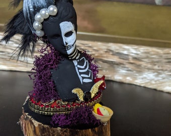 Voodoo doll skull face