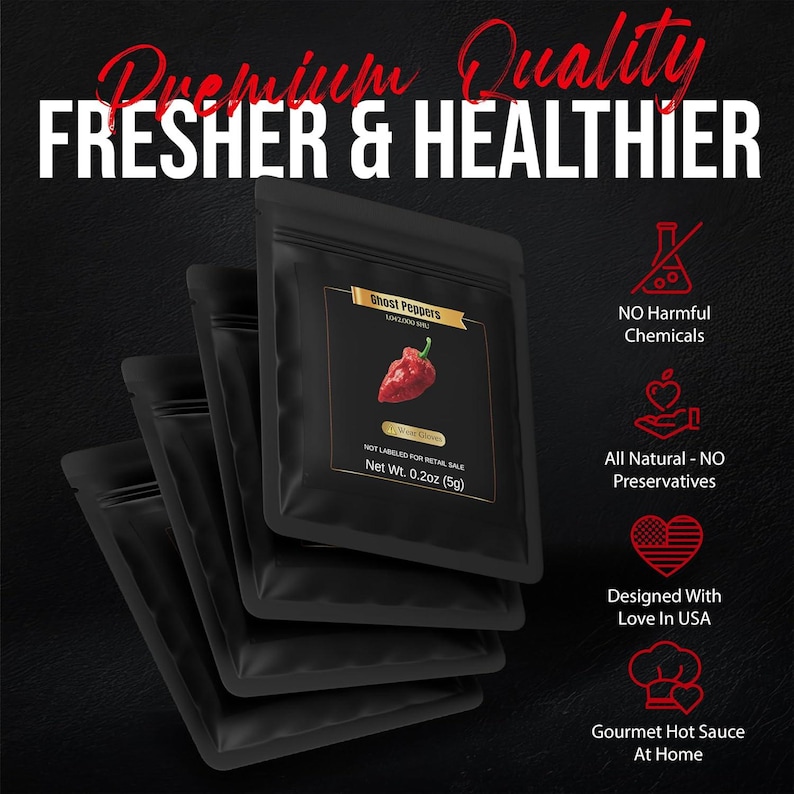 May include: Black pouches of Ghost Peppers with the text "Premium Quality, Fresher & Healthier." Each pouch has a label with a red pepper illustration. The label also states "Net Wt. 0.2oz (5g)." Additional text includes "No Harmful Chemicals" and "Designed With Love In USA."