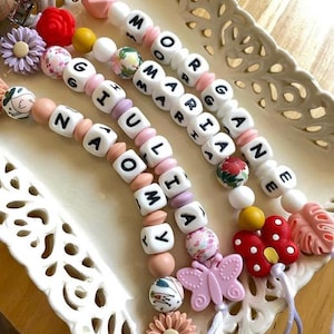 Personalized pacifier clip