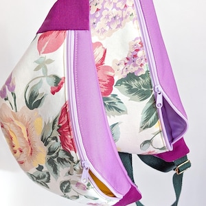 May include: A set of three ceramic mugs with a speckled, matte finish. The mugs are in shades of cream, light gray, and dark gray. Each mug has a simple, minimalist design, perfect for coffee or tea.