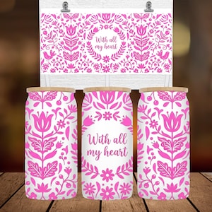May include: Three glass tumblers with wooden lids and a decorative floral design in pink. The design includes flowers, leaves, and the text "With all my heart". A matching decorative sign is above the tumblers.