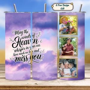 May include: A purple and white tumbler with a sky-like design and the text "May the winds of Heaven whisper in your ear how much we love and miss you." It features three framed photos and a straw.