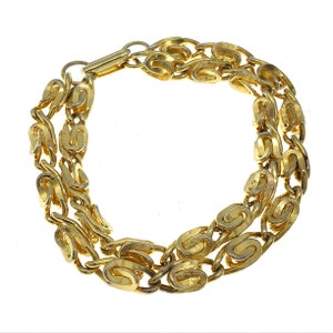 Bracciale vintage a maglie a spirale con finitura oro anni '80: doppio filo audace