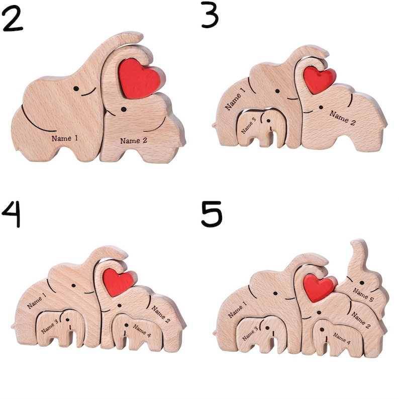 May include: Wooden elephant family puzzle with a red heart. The puzzle is made of light-colored wood and features elephants of different sizes. Each elephant has a name label. The puzzle is a decorative item.