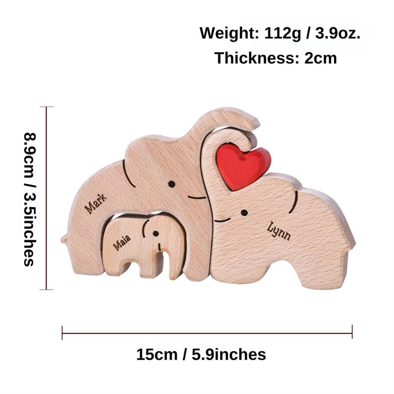 May include: Wooden elephant family puzzle with the names Mark, Maia, and Lynn. The puzzle is 5.9 inches long, 3.5 inches tall, and 0.8 inches thick. It weighs 3.9 ounces and features a red heart.