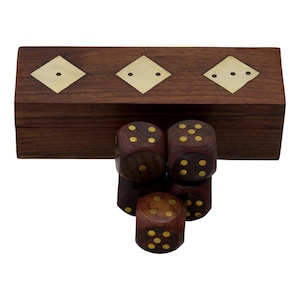 May include: A wooden dice set with a rectangular box and six dice. The box is dark brown with brass diamond inlays. The dice are dark brown with yellow dots.