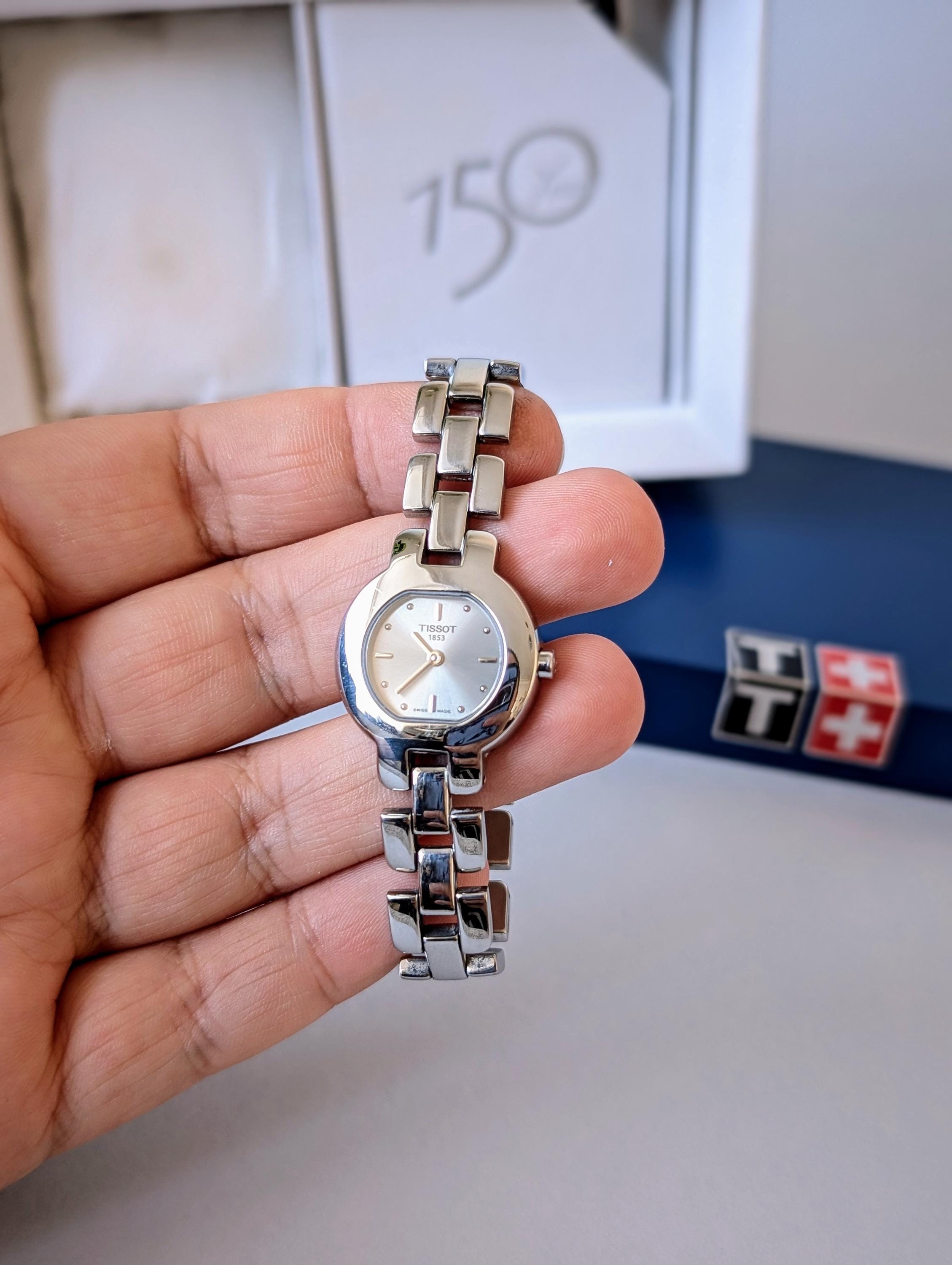 TISSOT ティソ 腕時計 G330 シルバーカラー SS レディース