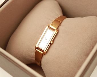 Gucci Ladies Gold Watch 1500L – Mother of Pearl Dial, Tank Face