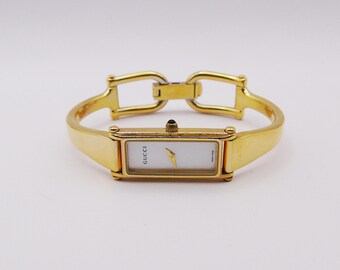 - Gucci Luxury RARE highly collectible 14k Gold Plated bracelet watch RARE Vintage GUCCI 6400L MOP Dial Gold Plated Bracelet Type  main image 3