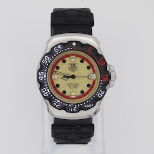 Tag Heuer Mens Formula 1 Watch – Rare Vintage F1 Design, Date Display, Working with Swiss Quartz Movement