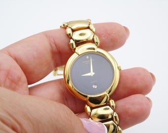 Relógio Raymond Weil banhado a ouro, elegante relógio de pulso suíço com caixa.