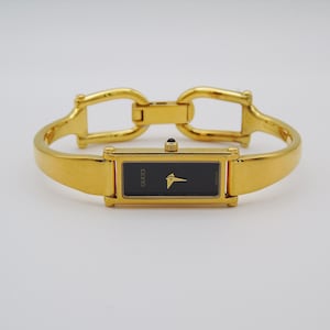 Montre Gucci 1500 L en or – montre Gucci vintage, élégante montre tank en or