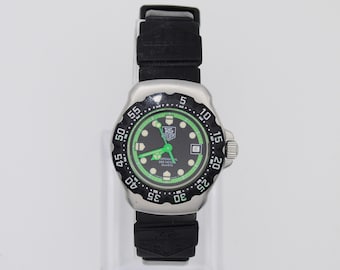 Reloj Tag Heuer vintage para mujer, bisel verde, cuarzo suizo.