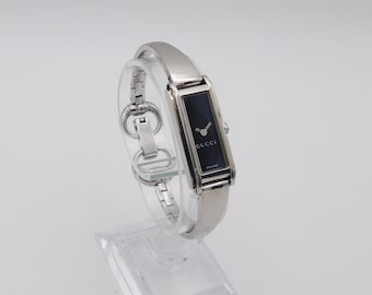 Vintage Gucci Watch: 1500L Black Dial, Stainless Steel Tank Style