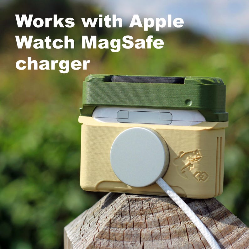 May include: A two-tone case for an Apple Watch MagSafe charger. The case is olive green and light yellow with a white charging disc and cable. The text "Works with Apple Watch MagSafe charger" is at the top.