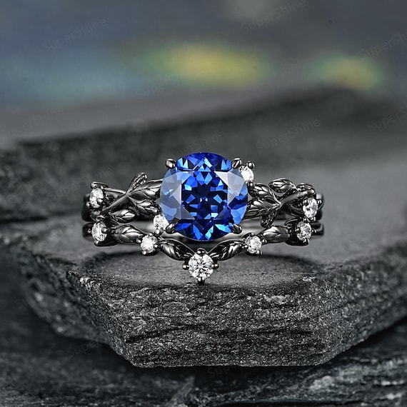 Black wedding rings with blue stones discount