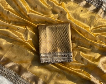 Royal golden tissue silk saree with handwoven lace zari border & festive shine