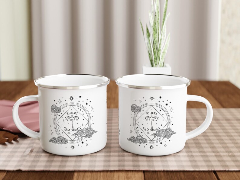 12oz enamel mug with celestial dragon design inspired by Fourth Wing and fantasy books. Perfect for Rebecca Yarros fans, book lovers, and dragon enthusiasts. Features mystical patterns, constellation-inspired art, and cozy aesthetics. Ideal fantasy merch for romantasy and Empyrean series fans. Great for bookstagram, cozy mornings, camping, or gifting. Tags: dragon aesthetic, fantasy mug, Fourth Wing merch, bookish decor, dragon gift, fantasy lover gift, booktok trending.