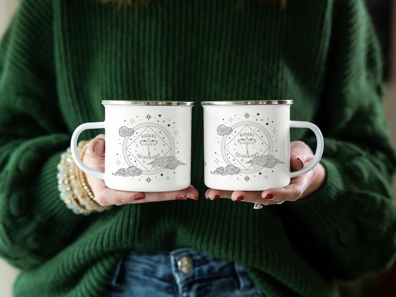 12oz enamel mug with celestial dragon design inspired by Fourth Wing and fantasy books. Perfect for Rebecca Yarros fans, book lovers, and dragon enthusiasts. Features mystical patterns, constellation-inspired art, and cozy aesthetics. Ideal fantasy merch for romantasy and Empyrean series fans. Great for bookstagram, cozy mornings, camping, or gifting. Tags: dragon aesthetic, fantasy mug, Fourth Wing merch, bookish decor, dragon gift, fantasy lover gift, booktok trending.