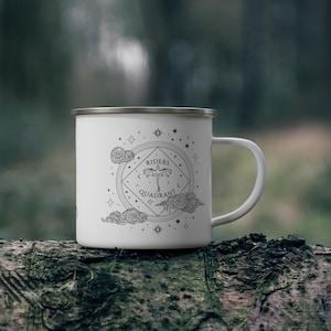12oz enamel mug with celestial dragon design inspired by Fourth Wing and fantasy books. Perfect for Rebecca Yarros fans, book lovers, and dragon enthusiasts. Features mystical patterns, constellation-inspired art, and cozy aesthetics. Ideal fantasy merch for romantasy and Empyrean series fans. Great for bookstagram, cozy mornings, camping, or gifting. Tags: dragon aesthetic, fantasy mug, Fourth Wing merch, bookish decor, dragon gift, fantasy lover gift, booktok trending.