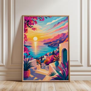 May include: A framed vertical wall art print depicting a coastal sunset scene with vibrant pink bougainvillea flowers in the foreground, white Mediterranean-style buildings, a calm blue sea, and a bright yellow sun setting behind purple mountains.