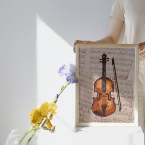 May include: A framed print of a vintage-style illustration of a violin with sheet music in the background. The frame is wooden and has a white mat.