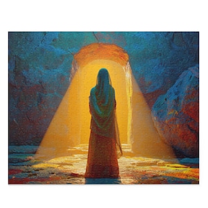 May include: A jigsaw puzzle depicting a person in a long robe and head covering, standing before a bright, golden light. The background shows a cave-like structure with blue and orange hues. The puzzle is a square shape.