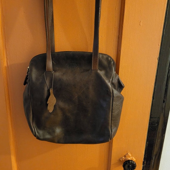 Vintage Bootleg CD Leather Duffle Bag — Roots