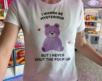 I Wanna Be Mysterious Baby Tee | Y2K Style Baby Shirt | Funny Graphic Tee | Retro 2000s Aesthetic | Girl Tshirt, Funny Graphic Baby Tee