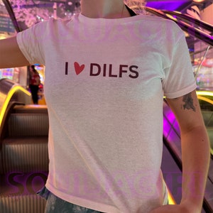 I Love Dilfs Funny Slogan Baby Tee, Y2K Crop Top, Y2K Tee, Y2K Funny Baby Tee, Funny Y2K Baby Tee, Outrageous Slogan Tee, Funny Girl Gift