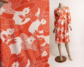 Vintage Novelty Print Woman Face Dolly Dress - Fancy Hat 70s Style Orange Red & White Op Art Empire Waist Long Sleeve Buttons - Medium