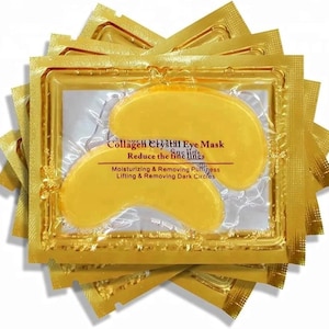 May include: A pack of gold-coloured collagen crystal eye masks. The packaging features the text "Collagen Crystal Eye Mask" and "Reduce the fine lines". The text also says "Moisturizing & Removing Puffiness" and "Lifting & Removing Dark Circles".