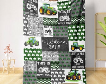 May include: Green and gray patchwork baby blanket with a tractor theme. The blanket features a variety of tractor designs, including a large green tractor, a smaller tractor with a red cab, and a tractor with a white cab. The blanket also features the text "Just a boy who love tractor", "This is how I roll", and "William Smith".