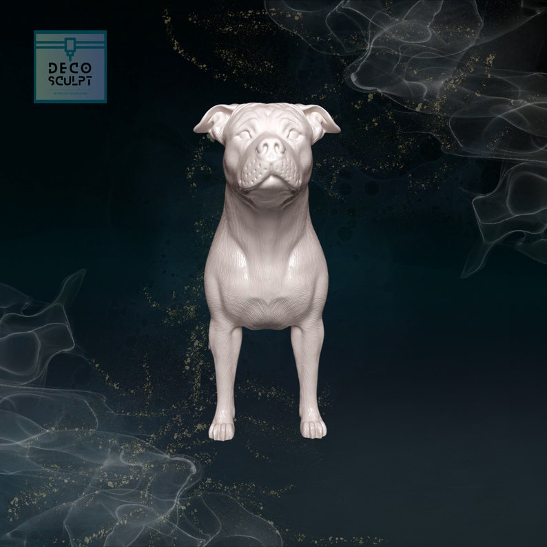 May include: A white, 3D printed figurine of a Staffordshire Bull Terrier standing on a dark blue background. The dog is looking directly at the camera.