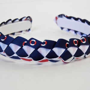 Hoofdband gevlochten grosgrain lint nautisch marineblauw rood witte strepen reddingsringen