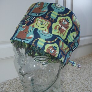 Tie Back FOLDING BAND Medical Surgical Scrub Hat with Blue Green Boo Monsters Yeti