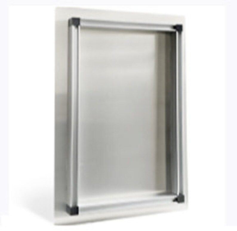 May include: A rectangular, stainless steel pet door with a silver frame and black corner accents. The door is mounted on a white surface, designed for easy pet access. The frame measures approximately 30 cm wide and 46 cm high.