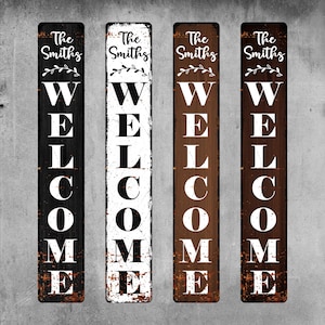 May include: Four vertical rectangular signs with a distressed finish. Each sign features the text The Smiths in script, a small leafy branch graphic, and the word WELCOME in large white capital letters. The signs are black, white, and brown.