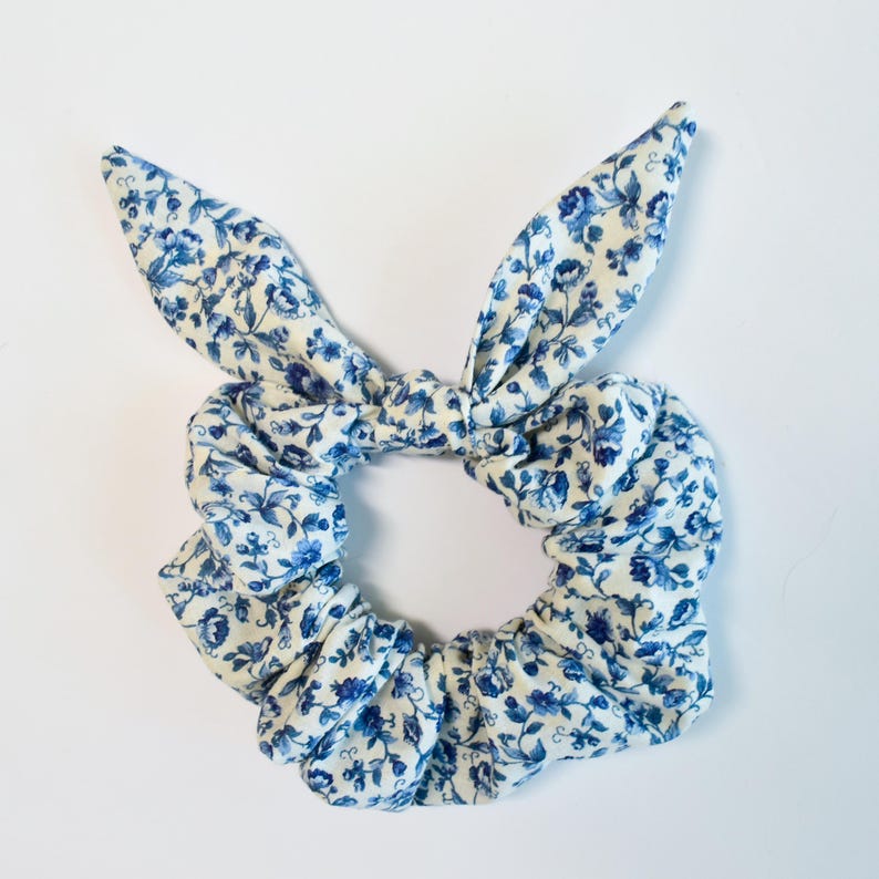 floral bow scrunchie, floral bow scrunchy, floral bow scrunchies, bow scrunchy, blue and white scrunchie, blue scrunchie, bow scrunchies, bow floral scrunchie, bow scrunchies, bow scrunchie, blue scrunchie, floral scrunchie, cottagecore, blue cotton scrunchie, blue scrunchie, floral scrunchie, blue scrunchy, blue and white floral scrunchie, blue floral scrunchie, scrunchies, Chateaucore, handmade Scrunchie, handmade scrunchies, Bachelorette Gifts, bridesmaid gifts, blue floral scrunchies