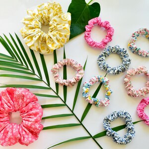 light pink scrunchie, pink scrunchie, skinny scrunchie, skinny floral scrunchie, skinny pink scrunchie, skinny cotton scrunchie, colorful scrunchie, handmade scrunchie, floral scrunchie, cotton scrunchie, pink cotton scrunchie, pink scrunchie, colorful scrunchy, floral scrunchie, pink scrunchy, blue and white scrunchie, pink floral scrunchie, blue floral scrunchie