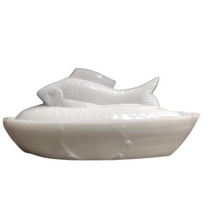 May include: A rustic wooden sign with the text "Welcome to our home" in white lettering. The sign features a distressed finish and a simple, inviting design, perfect for entryway decor.