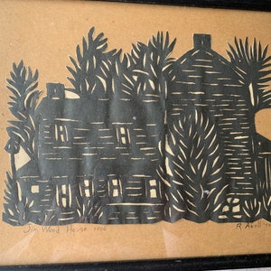 May include: A black and white print of a house with trees, titled "Jim Wood House 1906" and signed "R. Abell '92".