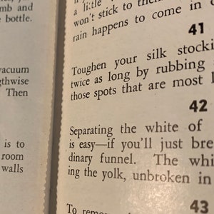 May include: A page from a vintage book with tips on how to clean and care for household items. The page features numbered tips, including how to clean Venetian blinds, toughen silk stockings, and separate egg yolks.