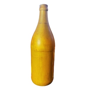 May include: A tall, yellow bottle with a rounded base and a narrow neck. The bottle has a smooth, painted surface and a cork-like top. The bottle is standing upright against a white background.