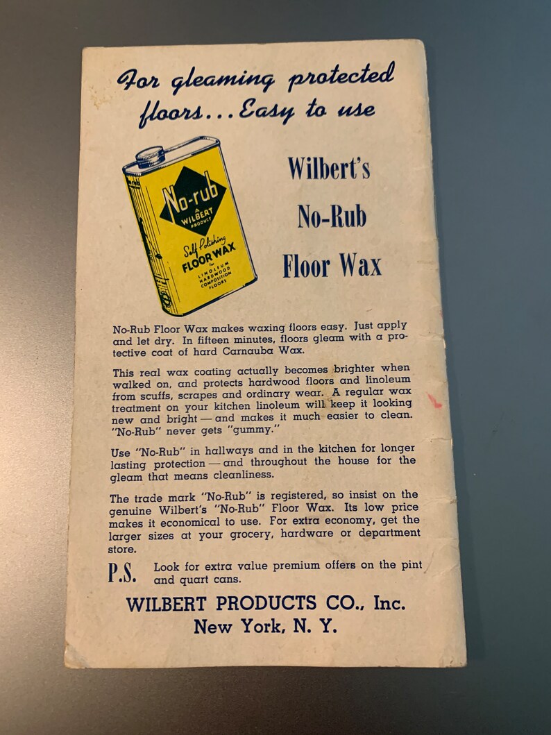 May include: A yellow and blue can of No-Rub Self Polishing Floor Wax, a Wilbert product. The can is labeled with the text "No-Rub" and "Wilbert Product". The text "Self Polishing Floor Wax" is also on the can. The can is sitting on a white background with text about the product.