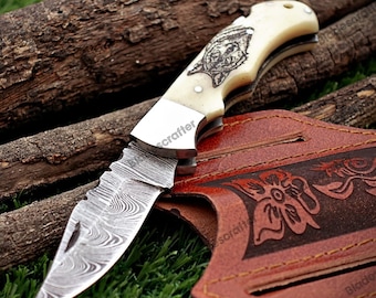 Navaja plegable de Damasco hecha a mano: mango con grabado de lobo, acero de alto carbono