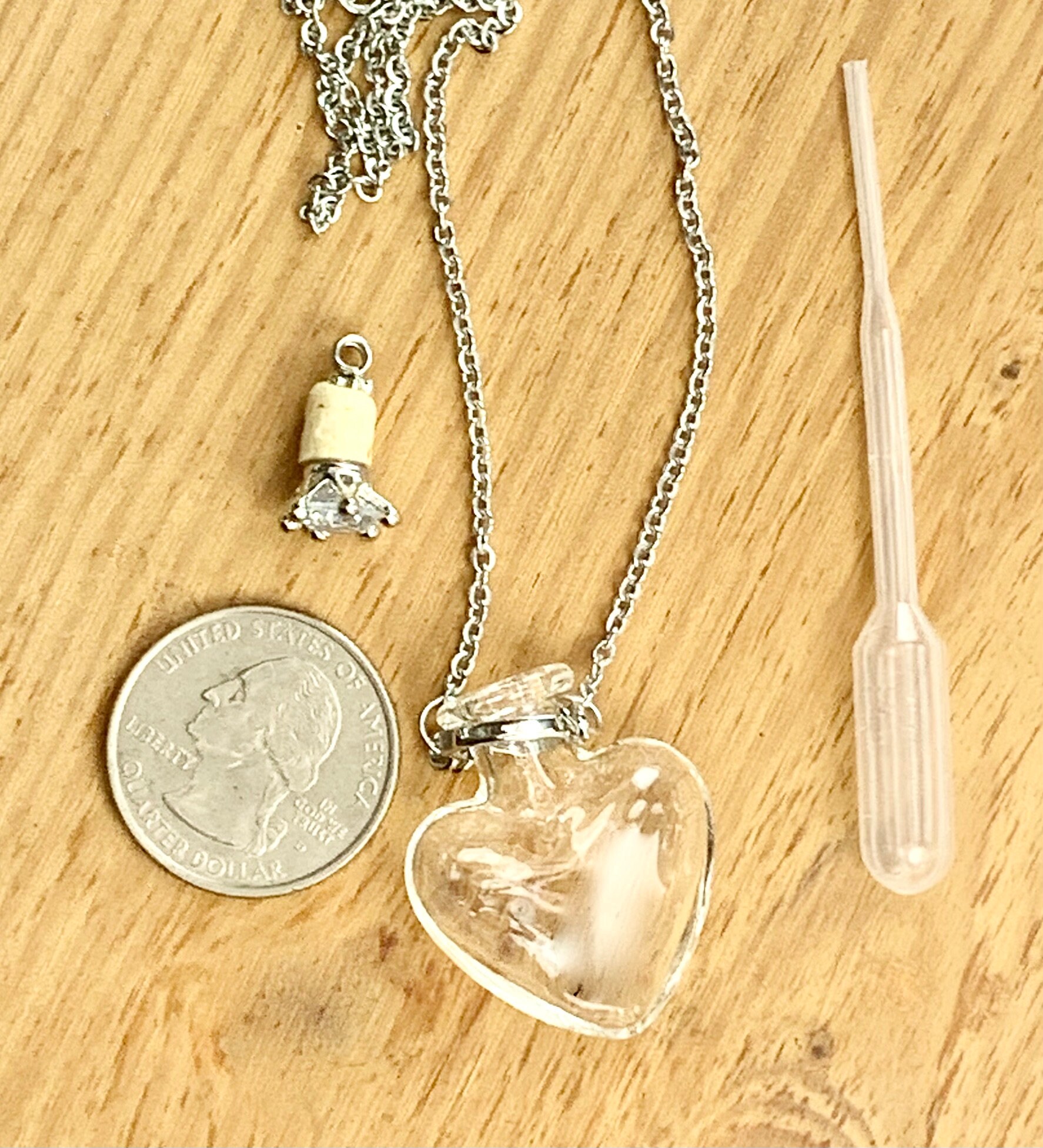 Heart shaped vial necklace deals