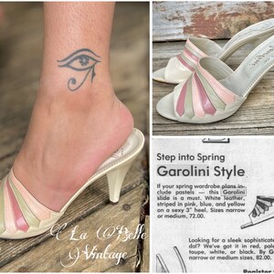 May include: White leather heeled sandals with pink, blue, and yellow stripes. The sandals have a 3-inch heel. The text "Step into Spring Garolini Style" is visible in the image.